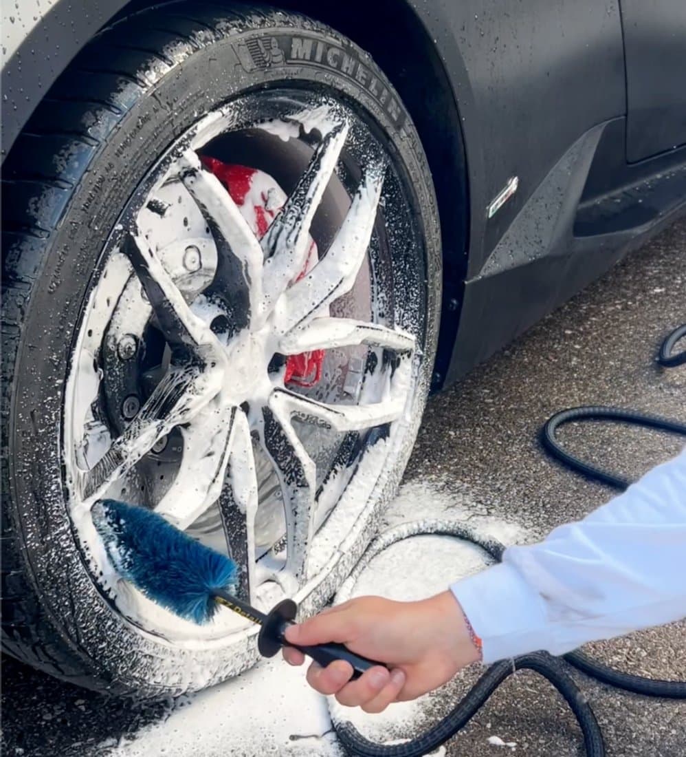 Detailed wheel cleaning with foam brush