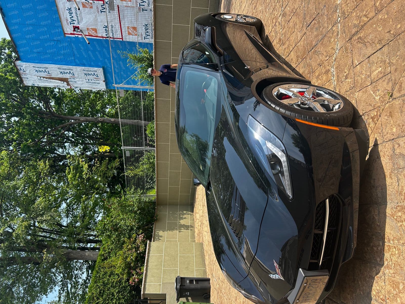 Black Corvette with showroom-ready finish after detail