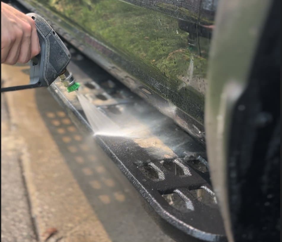 Pressure washing exterior surface grime away